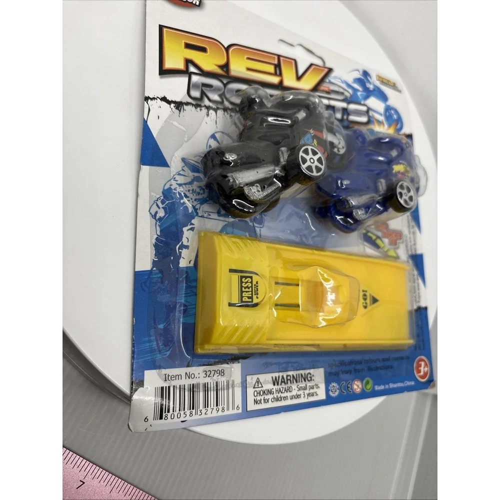 New Rev Rockets Motorcycles Press And Go Plastic Toys Motorcycle with Launch Pad